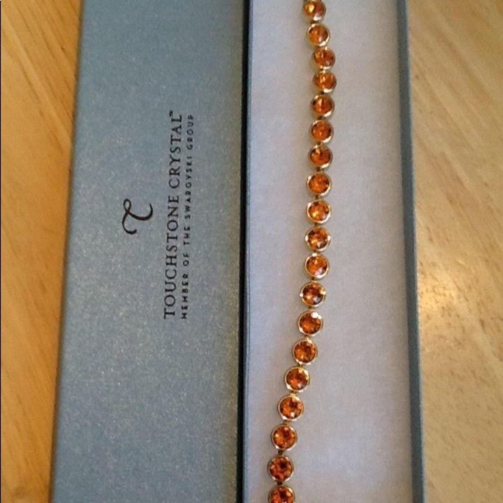 ISO-  tangerine ice bracelet by Touchstone Crystal